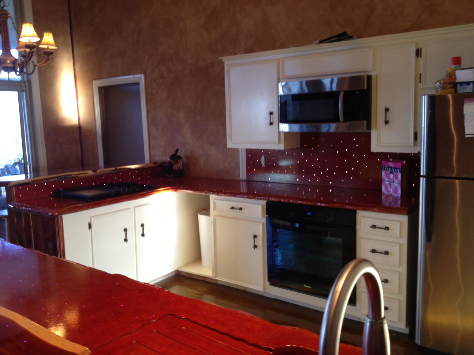 Vibrant red concrete countertops in a kitchen