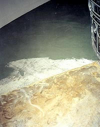 Upon removal of the carpet on the ramps going into the theater, they found that the base was made out of wood, not concrete.