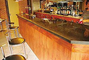 Michael Archambault concrete countertop in a French bar near Paris.