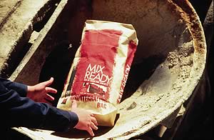 dding powdered pigments to mobile mixers has been simplified by the use of repulpable bags that can be tossed into a mixer without opening or pouring.