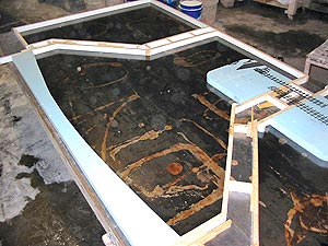 Brandon Gore, of the Gore Design Company, Tempe, Ariz., cautions that melamine can torque when the mold is screwed together, resulting in waves in a long span.
