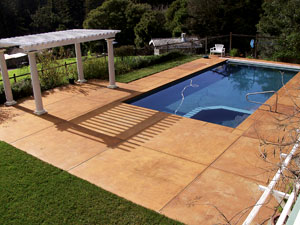 Pool Decks Photo courtesy of Tom Ralston Concrete Ralston agrees that greater slope will drain water more effectively, but says, "We feel ¼ inch is too much fall and when setting patio furniture it is a little more noticeable and not as comfortable. There is always a light bit of water here and there, and we let the clients know that. Ultimately, it is the client who will make the decision."
