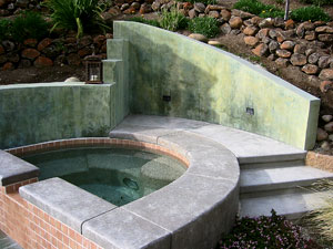 Slip resistance is an important consideration when choosing a texture. "Don't use a tight trowel finish on a pool deck," McMahon says. "A typical broom finish is rough enough to prevent slippage." Photo courtesy of Tom Ralston Concrete