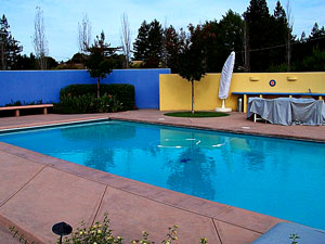 One big difference between patios and pool decks is finishing the edges. It used to be that fairly complex forms were required to create a rounded edge. In fact, copings were often precast instead of poured in place to avoid this extra form work. Photo courtesy of Tom Ralston Concrete