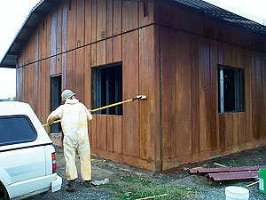 Potawat Health Village - Workers started by spraying a base coat of Antique Amber onto each wall, then applying several additional colors, including Faded Terracotta, Padre Brown, Black, and Fern Green. 