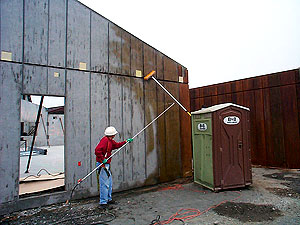 Sacramento contractor Concrete Surfacing Systems Inc. used reactive stains to duplicate redwood's rich shades for the 12 buildings in the complex. "It looks exactly like wood," says company president Rod Scott. "We actually had guys call us up saying they had walked up to a building and they could swear they could pound a nail into it."