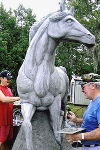 Life size mustang concrete sculpture