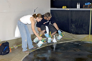 In one corner of the room is a "sun," a 13-foot quarter circle outlined by an 8-inch wide band of embedded lights. Rigsby cut a trench into the concrete so an electrician could embed the lights. Then the trench was backfilled with pigmented epoxy.