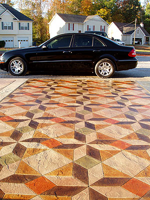 Harris recreated the look of an old Italian floor on this exterior area by using acid stain, then following it with layers of water-based acrylic stains.