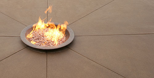 Creating Sand-Etch Finishes - We also stumbled across a second obstacle using this finish with colored concrete. As the acid was burning the top away, it was changing the integral color.