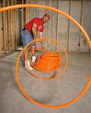 Radiant tubing is prepared for a home in Idaho Falls, Mo.
