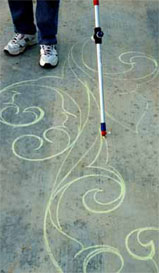 Quick Draw Example - Quick Draw is sold in three ways. Customers may purchase Quick Draw, the 4-foot auto-dispensing chalk drawing tool, on its own. They may buy the Design & Layout Tool with its extensions. Or they can opt for Quick Draw Design Plus that comes with a Grinder Caddy from Pearl Abrasive Co.