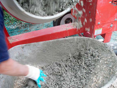 Mixing a batch of Tradical Hemcrete. The building material can be poured or pressure-applied.
